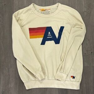 Aviator Nation Cream Sweater with Multicolor Stripe Logo